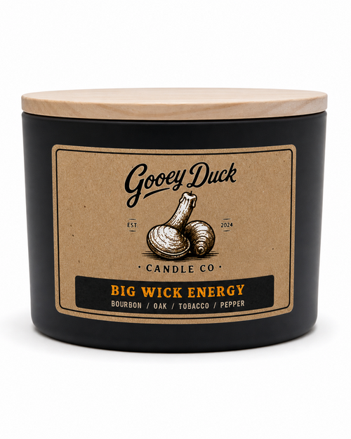 Gooey Duck candle with a label on a white background