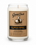 Gooey Duck Candle Co candle with label on a white background