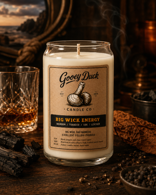 Gooey Duck candle with a label on a wooden surface with decorative elements.