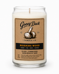 Gooey Duck candle with a label on a white background