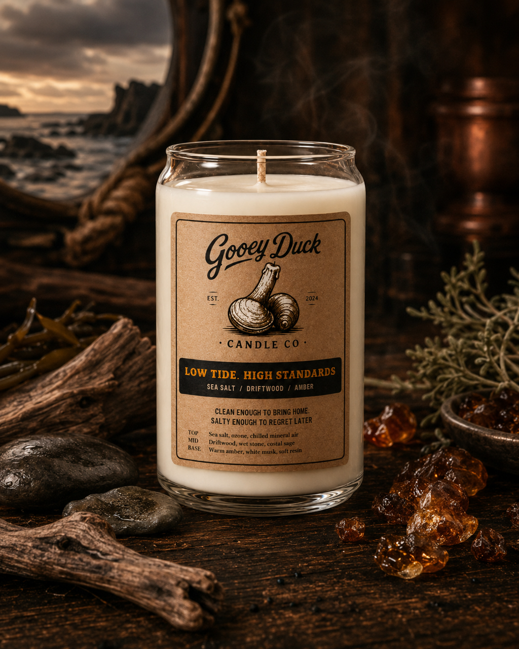 Gooey Duck Candle Co. candle with label on a rustic background