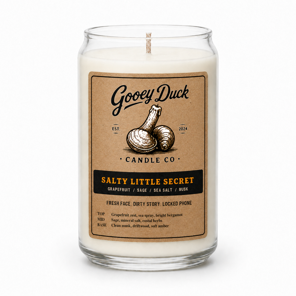 Gooey Duck candle with a label on a white background