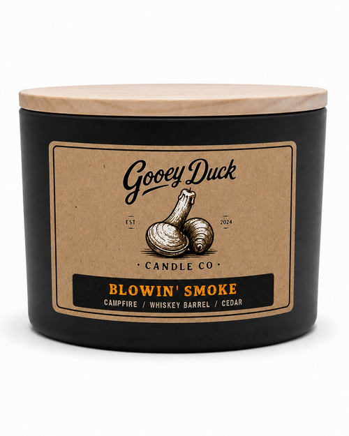 Gooey Duck Candle Co. candle with 'Blowin' Smoke' scent on a white background