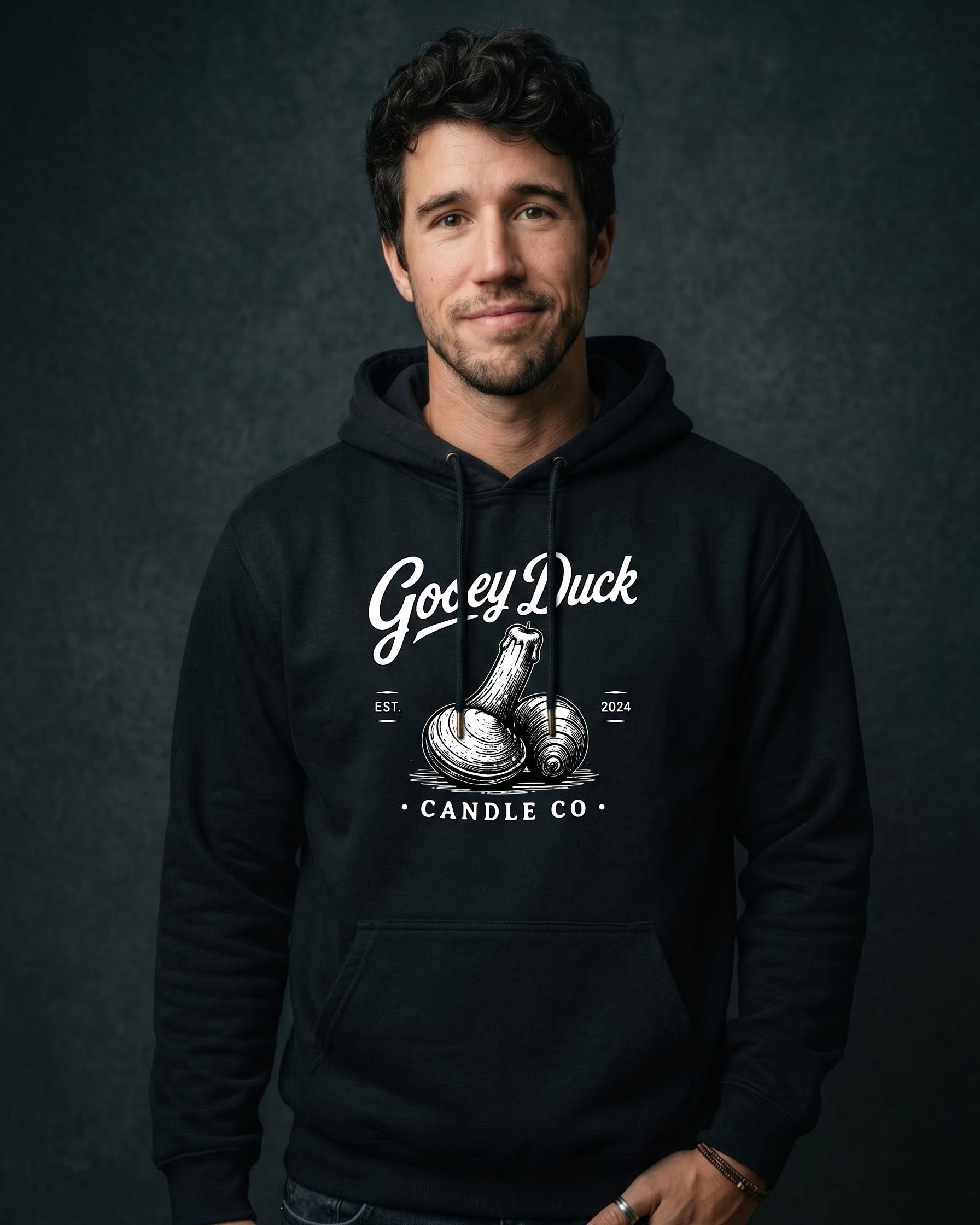 Model wearing jet black Gooey Duck Clam Logo Hoodie