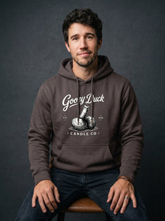 Model wearing dark chocolate brown Gooey Duck Clam Logo Hoodie